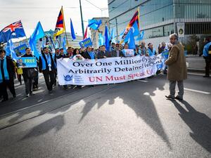 Uyghurs and Tibetan people demonstrate against China outside of the United Nations (UN) offices during the Universal Periodic Review of China by the UN Human Rights Council, on November 6, 2018 in Geneva. (Fabrice COFFRINI / AFP)