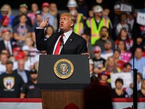 US President Donald Trump speaks to supporters at his rally inside the WesBanco Arena on September 29, 2018 in West Virginia. (AFP/ File Photo)
