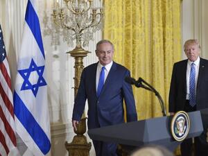 US President Donald Trump and Israel's Prime Minister Benjamin Netanyahu take arrive for a joint press conference in the East Room of the White House on February 15, 2017 in Washington, DC. (AFP/Mandel Ngan)