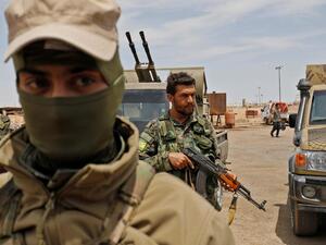 Members of the Syrian Democratic Forces gather at Al Tanak oil field as they prepare to relaunch a military campaign against ISIS. (AFP/File)