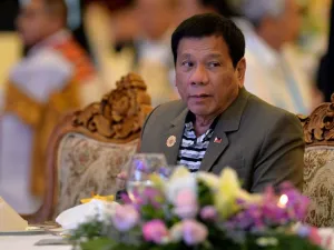 'I will eat you alive,' Philippine President Rodrigo Duterte told terrorists during an address to the Filipino community in Laos in September 2016. (AFP/Ye Aung)