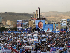 Hundreds of thousands of Yemenis hold posters and portraits of Yemen's ex-president Ali Abdullah Saleh during a demonstration in support of the former president, as his political party marks 35 years since its founding, at Sabaeen Square in the capital Sanaa, August 24, 2017. | AFP