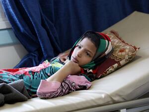 A Yemeni youth suspected of being infected with cholera receives treatment at a hospital in Sanaa on May 25, 2017. (AFP/Mohammed Huwais)