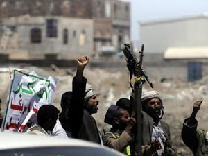 Houthi rebels celebrate the capture of the capital last month (AFP/ File Photo)
