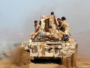 Yemeni pro-government forces patrol during clashes against Shia rebels. (AFP/ SALEH AL-OBEIDI)