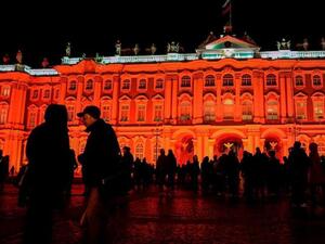 The State Hermitage Museum is seen illuminated in red for the centenary of the Bolshevik revolution in Saint Petersburg on October 25, 2017. (AFP/ File)
