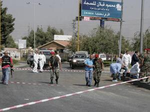 Lebanese security forces and forensics check the site of a bomb blast in Zahle, near the border with Syria. (AFP/Hassan Jarrah)
