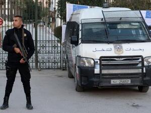 A Tunisian policeman stands guard in front of the Bardo National Museum on March 23, 2015 in Tunis after a terrorist attack killed 23 people. (AFP/File)