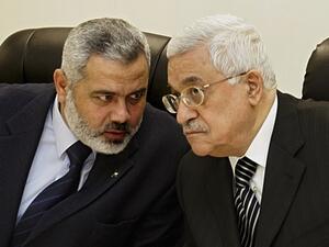 ينص اتفاق القاهرة على تشكيل حكومة وحدة وطنية وإجراء انتخابات رئاسية وبرلمانية 