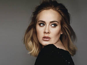 النجمة العالمية "أديل" بالعباية "السوداء" لدعم ضحايا حريق لندن
