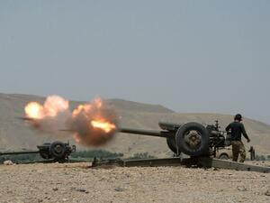 An Afghan National Army soldier fires at Daesh militants in Kot, in the eastern Nangarhar province on June 26, 2016. (AFP/Noorullah Shirzada)
