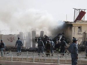 Afghan police inspect a suicide car bombing of the police chief's office in Lashkar Gah in Helmand province. Image used for illustrative purposes. (AFP/File)