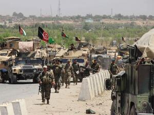 Afghan troops walk in the Chardarah district of Kunduz province on June 21, 2015. (AFP/File)