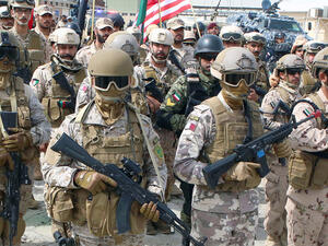 There are around 96,000 stateless people in Kuwait. Pictured: U.S. and Kuwaiti Troops. (AFP/File)