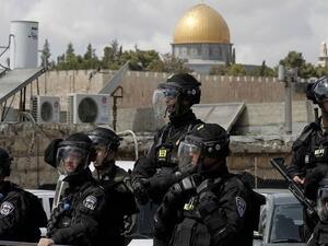Israeli forces stand guard in front of al-Aqsa Mosque. (Al Bawaba)