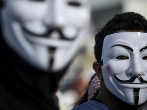 A member of anonymous donning a face mask. (AFP/Mohhamed Shaikh)