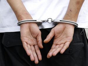 Hands in handcuffs (AFP/File Photo)