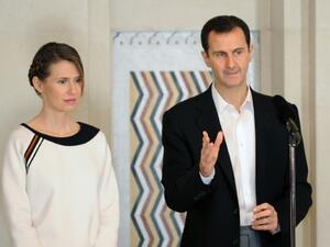 الرئيس السوري بشار الأسد وزوجته اسماء
