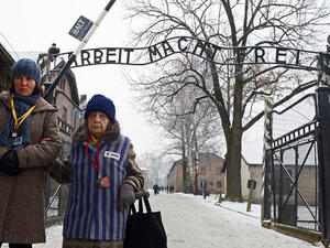 A former concentration camp prisoner at the memorial site of the former Nazi concentration camp Auschwitz-Birkenau in Oswiecim (AFP/File Photo)