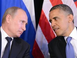 US President Barack Obama (R) and Russian President Vladimir Putin at a meeting on the sidelines of the G20 summit in Los Cabos, Mexico on June 18, 2012. (AFP/File)