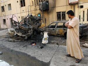 سيارات محترقة في الطالبية نتيجة التفجيرات
