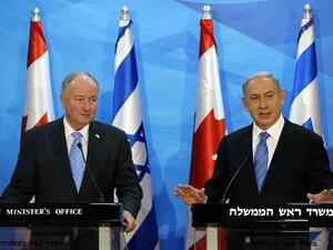 وزير الخارجية الكندي روبرت نيكلسون خلال مؤتمر صحفي مع رئيس الوزراء الاسرائيلي بنيامين نتانياهو.
