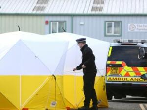 British emergency services put a tent over the bench where Sergei Skripal and his daughter, Yulia, were found (AFP/File Photo)	