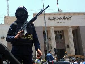 A Egypt security officer stands guard in front of a newly-built courthouse in Egypt. (AFP/File)