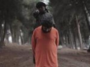 طفل "داعشي" أسود يذبح إمام مسجد بسوريا