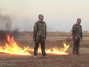  صبّ عليهما أحد جنود التنظيم مادة حارقة لتشتغل النيران في جسديهما 