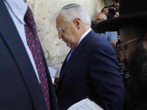 US ambassador to Israel David Friedman (C) and Rabbi Shmuel Rabinovitch (R) pray at the Western Wall in the old city of Jerusalem al-Quds on May 15, 2017. (AFP)