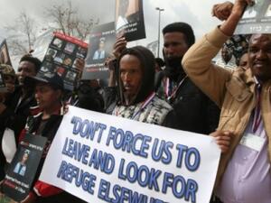 African asylum seekers, mostly from Eritrea, protest Israel's deportation policy in front of the Supreme Court in Jerusalem (AFP/File Photo)	