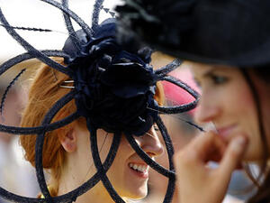 Guests wearing hats arrive at the Meydan racecourse to attend the Dubai World Cup day horse racing event in the United Arab Emirate of Dubai. (AFP/File)