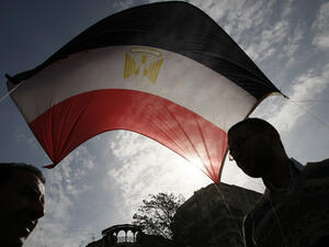 Egypt's finance minister welcomed a revision of ratings provider Standard and Poor, saying the change will encourage financial institutions to offer further funding. (AFP/Mohammed Abed)