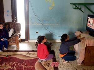 A child is considered to be suffering from multidimensional poverty when it is severely deprived of at least two of the eight dimensions of child welfare (Mohamed el-Shahed/AFP)