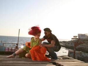 Mariam Fares with the late Yahia Sa'adeh in her latest clip;