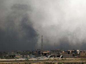 Smoke rises after a US-led coalition airstrike in southern Fallujah. (AFP/Ahmad Al-Rubaye)