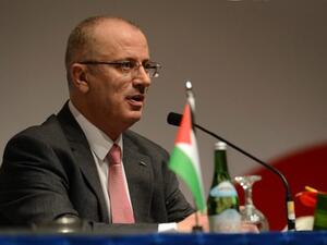 Hamdallah also called on world countries to recognize a Palestinian state with East Jerusalem as its capital (AFP/File)