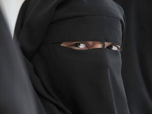 They argue the new face-covering law takes direct aim at Muslims who wear a niqab or burqa (AFP/File)