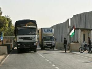 شاحنات للامم المتحدة تدخل رفح عبر معبر كرم ابو سالم بين اسرائيل وقطاع غزة