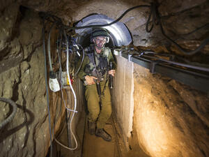 An Israeli soldier in one of the tunnels that the Israel Defense Force discovered. The Hamas spokesperson, Mushir al-Masri, vowed Hamas would dig more (Jack Guez/ AFP).