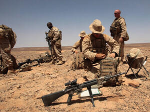US soldiers prepare their gear during the military exercise near the Jordanian border. (AFP/File)