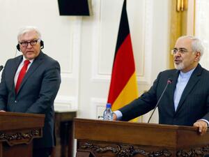 Iran's Foreign Minister Mohammad Javad Zarif (R) and his German counterpart, Frank-Walter Steinmeier, during a meeting on February 2, 2016, in Tehran. (Atta Kenare/ AFP)
