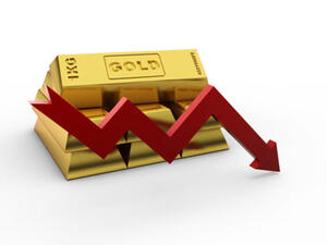 وسط تعاملات هادئة هبط الذهب في المعاملات الفورية 0.3 بالمئة إلى 1193.80 دولار للأوقية (الأونصة)