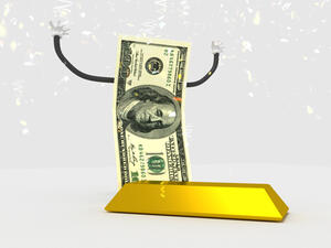 قوة الدولار تهوي بالذهب متخلياً عن أرباحه بنسبة 7% في شهر 