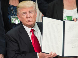 US President Donald Trump signs bill to give prosecutors more power to target sex trafficking advertisements online. (AFP/ File Photo)