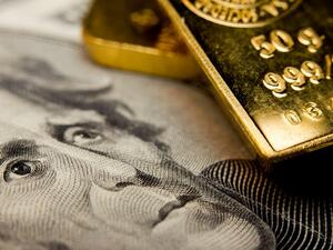 Gold hits one-month peak as dollar drops on uncertainty surrounding new US tax code. (Shutterstock)