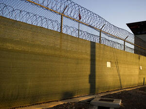Younis Abdurrahman Chekkouri was taken into custody shortly after his flight home. (AFP/Jim Watson)
