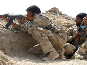 مسلّحان من مليشيا "الحشد الشعبي" / فرانس برس