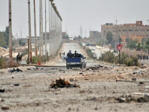 ارشيف/ سيارة تقل مقاتلين اكرادا قرب الحسكة